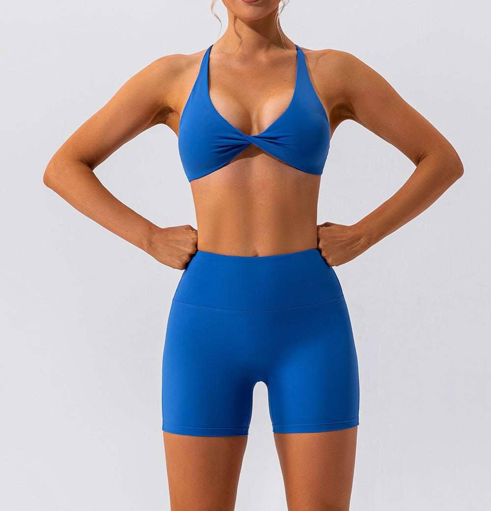 Cross back twisted front sports bra