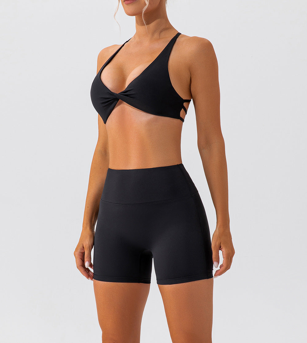 Cross back twisted front sports bra