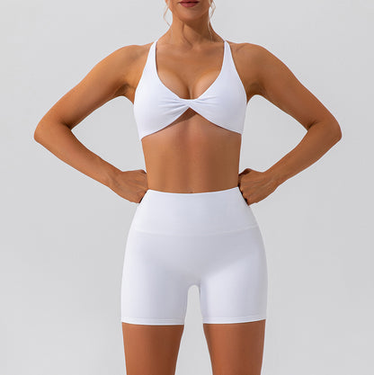 Cross back twisted front sports bra