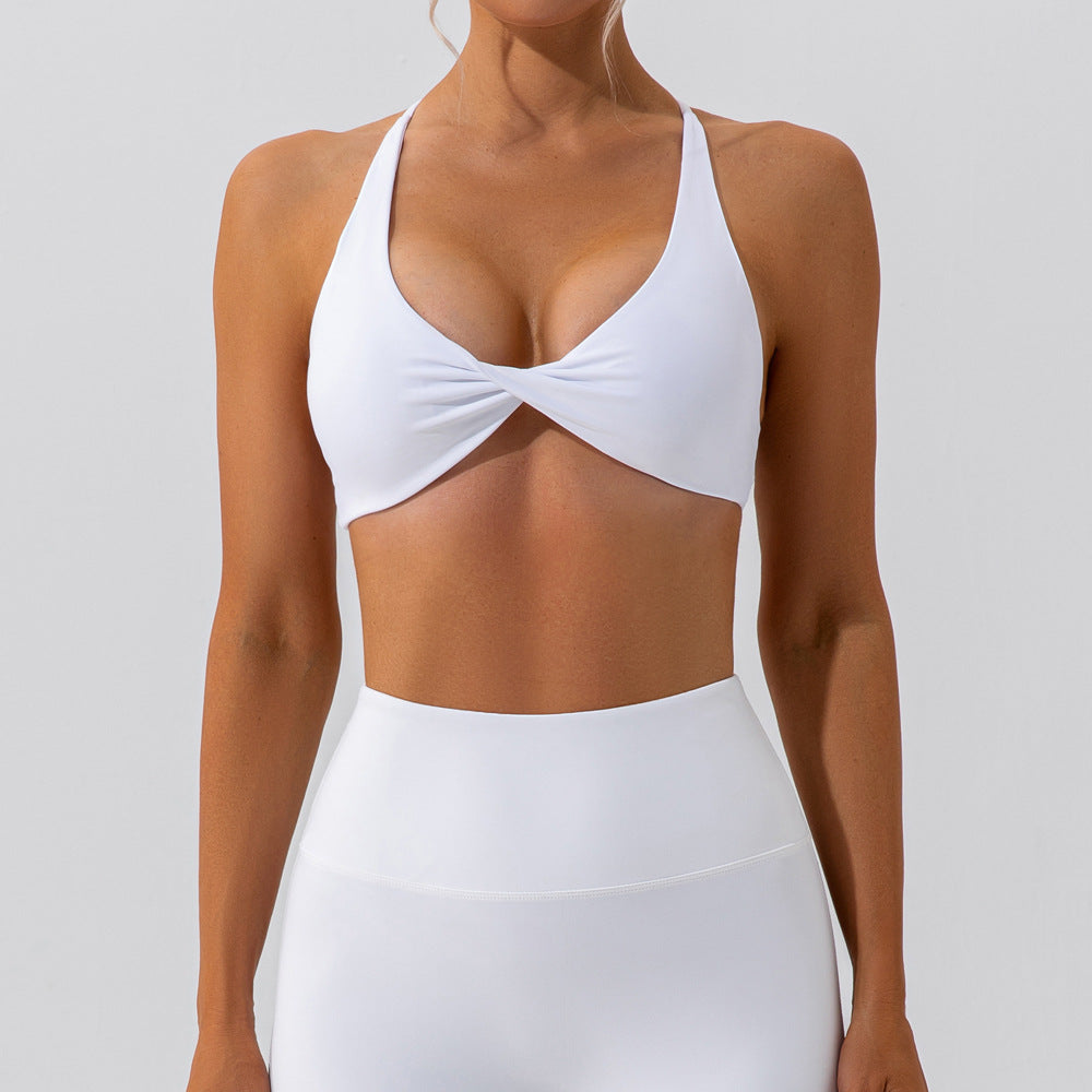 Cross back twisted front sports bra