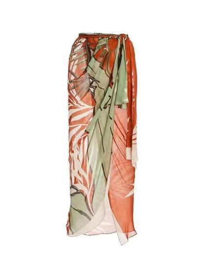 One shoulder swimsuit with matching sarong