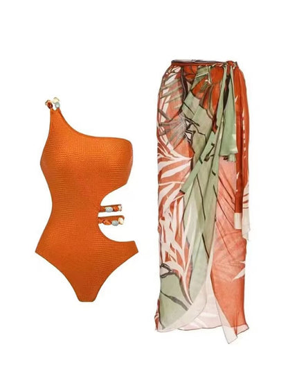 One shoulder swimsuit with matching sarong