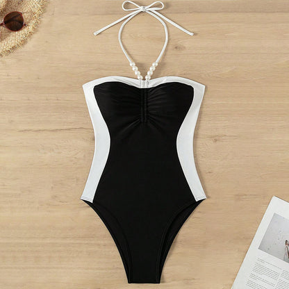 Monochrome swimsuit with bead trim