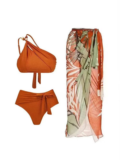 One shoulder swimsuit with matching sarong