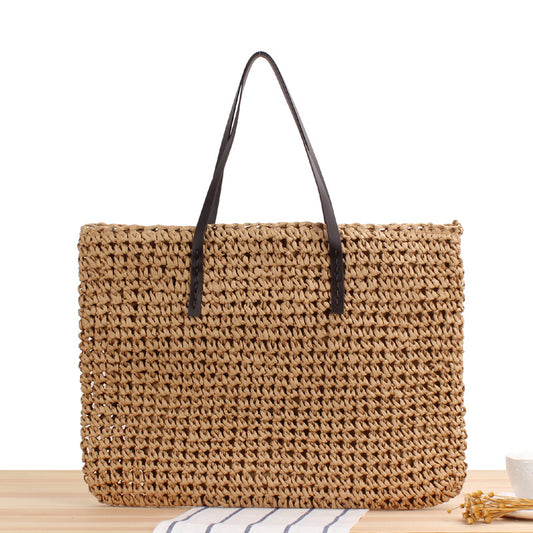 Straw bag with leather handle